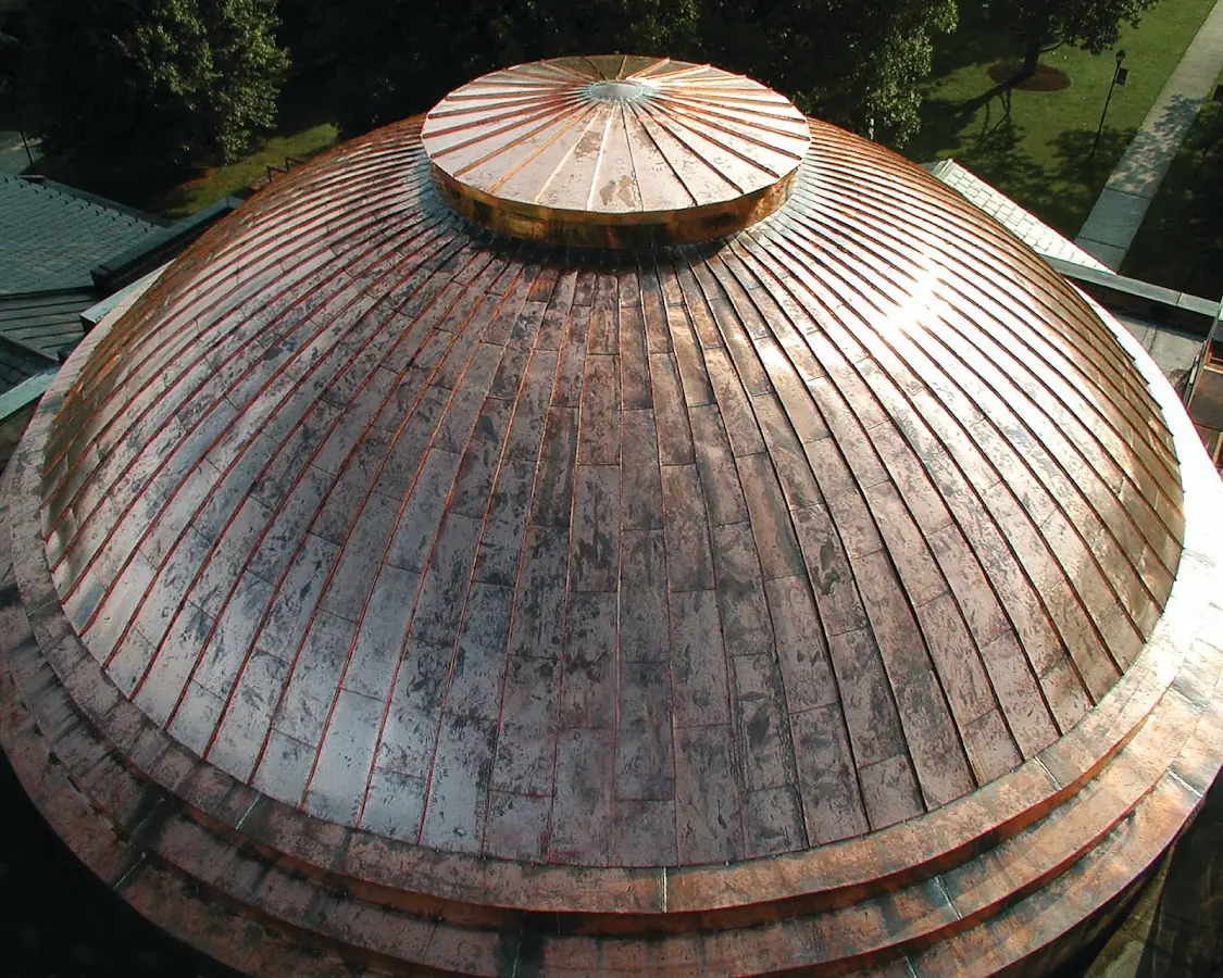 Craftsman Roofing crew installing a new roof in Ayer